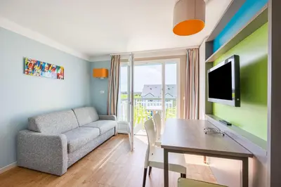 Télévision ou salle de divertissement dans l'établissement Némo - Appartement avec Terrasse