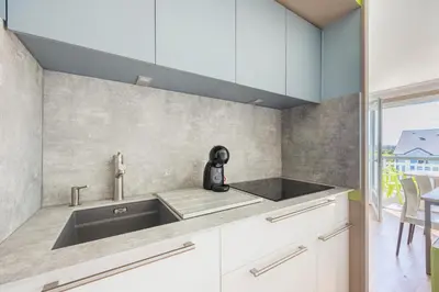 Cuisine ou kitchenette dans l'établissement Némo - Appartement avec Terrasse