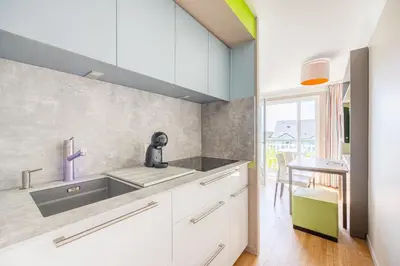 Cuisine ou kitchenette dans l'établissement Némo - Appartement avec Terrasse