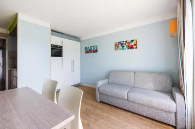 Coin salon dans l'établissement Némo - Appartement avec Terrasse