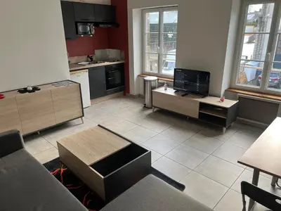 Cuisine ou kitchenette dans l'établissement 1 appartement neuf centre flers accès facile proche gare et commodités