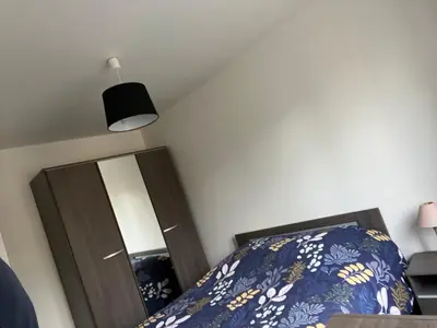 Un ou plusieurs lits dans un hébergement de l'établissement 1 appartement neuf centre flers accès facile proche gare et commodités