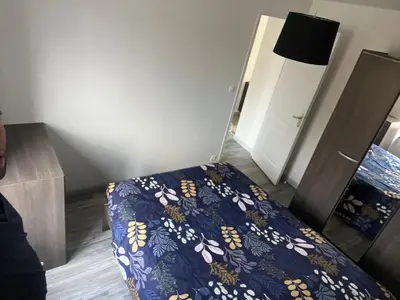 Un ou plusieurs lits dans un hébergement de l'établissement 1 appartement neuf centre flers accès facile proche gare et commodités
