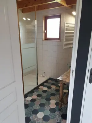 Salle de bains dans l'établissement LE CHALET