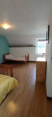 Un ou plusieurs lits dans un hébergement de l'établissement Loge de la Saire