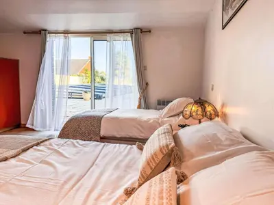 Un ou plusieurs lits dans un hébergement de l'établissement Holiday Home La houle by Interhome