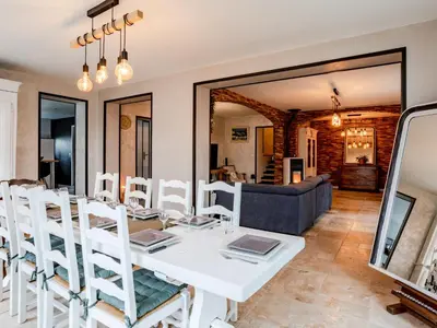 Coin salon dans l'établissement Holiday Home La Villa bleue by Interhome
