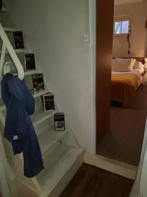 Un ou plusieurs lits dans un hébergement de l'établissement HERM'S Petite maison atypique et cour privative -