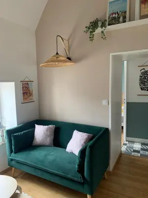 Coin salon dans l'établissement Charmant appartement rénové