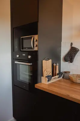 Cuisine ou kitchenette dans l'établissement La Casa Normande, entre Ville et Plages, avec jardin privé