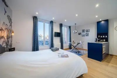 Télévision ou salle de divertissement dans l'établissement Appart 2 personnes à 50m des commerces & mer
