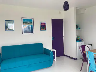 Coin salon dans l'établissement La Maison Bleue-Sciotot-Les Pieux