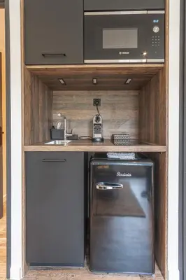 Cuisine ou kitchenette dans l'établissement La villa MaRisKa et son SPA