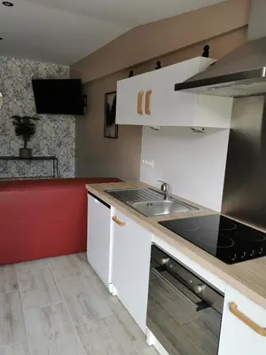 Cuisine ou kitchenette dans l'établissement La chaumière