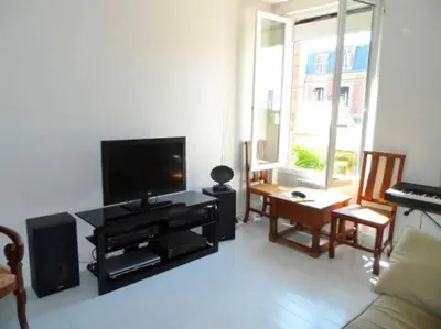 Télévision ou salle de divertissement dans l'établissement Cabourg éventail 3min à pied de la plage