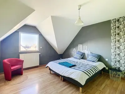 Un ou plusieurs lits dans un hébergement de l'établissement Grande maison de vacances