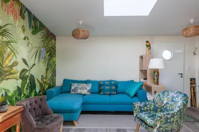 Coin salon dans l'établissement La Halte des Miquelots - Appt avec jardin