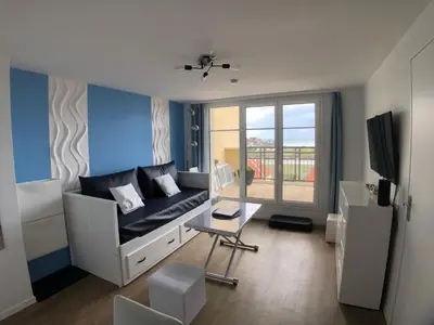 Télévision ou salle de divertissement dans l'établissement DIVINE MARINA vue mer - Piscines