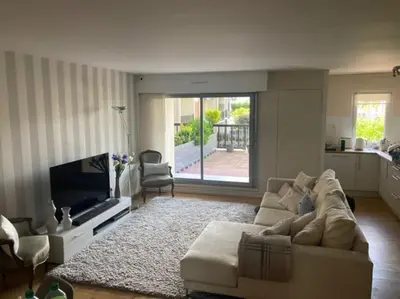 Télévision ou salle de divertissement dans l'établissement Bronzer à Cabourg ! 2Terrasses au soleil & abritéesduvent 80m2