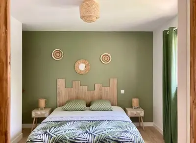 Un ou plusieurs lits dans un hébergement de l'établissement Maison neuve à deux pas du Mont