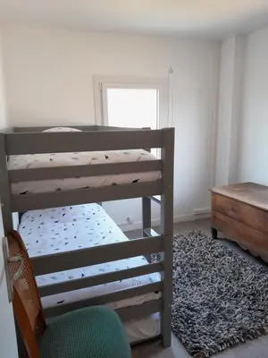 Un ou plusieurs lits dans un hébergement de l'établissement Maison de vacances Bréhal