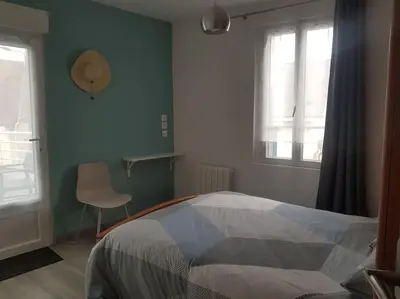 Un ou plusieurs lits dans un hébergement de l'établissement Maison Bateau