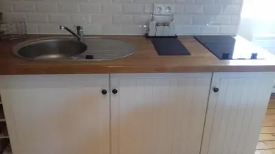 Cuisine ou kitchenette dans l'établissement studio Marie