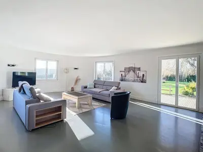 Coin salon dans l'établissement Maison de vacances en famille
