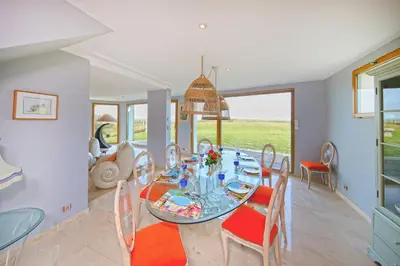 Coin salon dans l'établissement Les Mouettes - Maison vue mer