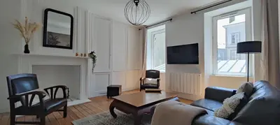 Télévision ou salle de divertissement dans l'établissement Le Corsaire