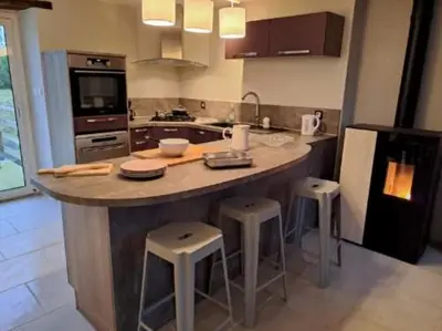 Cuisine ou kitchenette dans l'établissement Au P’tit Bijou