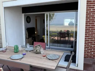 Balcon ou terrasse dans l'établissement Appartement 2P, Rez-de-jardin, Accès Plage, Animaux OK, Parking, Internet Inclus - FR-1-487-355