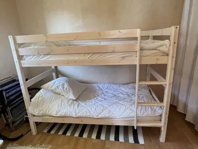 Un ou plusieurs lits dans un hébergement de l'établissement Appartement T3 cosy, proche plage et thalasso, avec balcon et équipements modernes, WiFi inclus - FR-1-487-356