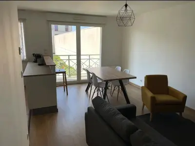 Coin salon dans l'établissement Appartement 2 chambres - 50m de la mer - parking