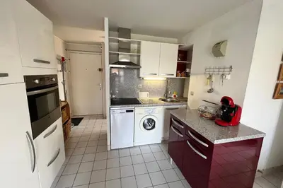 Cuisine ou kitchenette dans l'établissement Charming cocoon