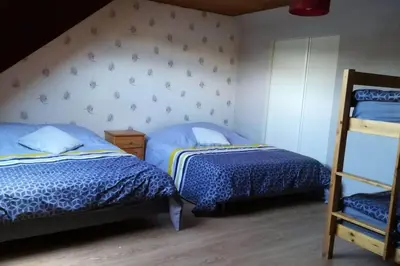 Un ou plusieurs lits dans un hébergement de l'établissement La Vallée en Cotentin
