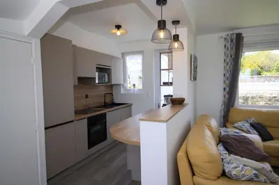 Cuisine ou kitchenette dans l'établissement Villa Quiné Plage