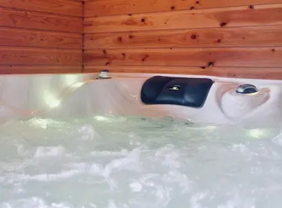 Salle de bains dans l'établissement Duplex accès jacuzzi illimité T