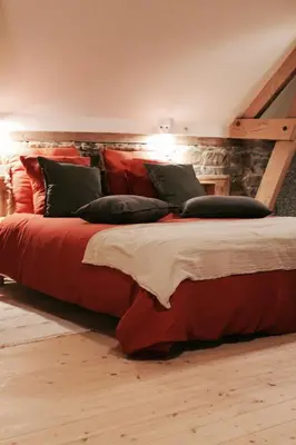 Un ou plusieurs lits dans un hébergement de l'établissement Duplex accès jacuzzi illimité M