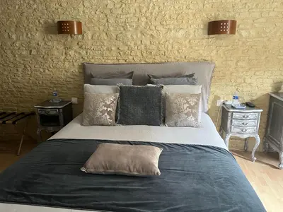 Un ou plusieurs lits dans un hébergement de l'établissement Chambres d’hôtes de l’Ancienne Auberge