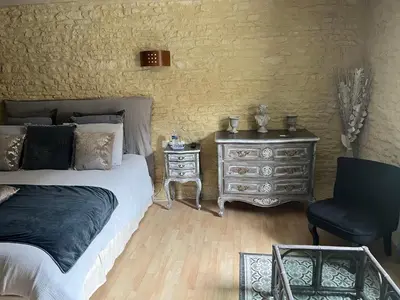 Un ou plusieurs lits dans un hébergement de l'établissement Chambres d’hôtes de l’Ancienne Auberge