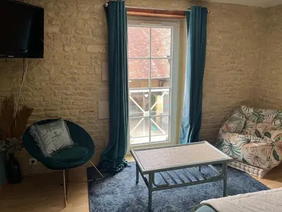 Télévision ou salle de divertissement dans l'établissement Chambres d’hôtes de l’Ancienne Auberge