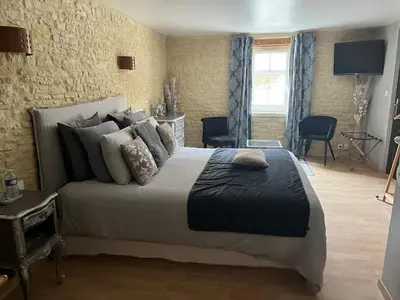Un ou plusieurs lits dans un hébergement de l'établissement Chambres d’hôtes de l’Ancienne Auberge