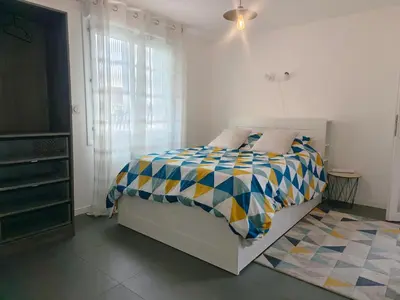 Un ou plusieurs lits dans un hébergement de l'établissement Gîte PEGASUS - 5 min plage