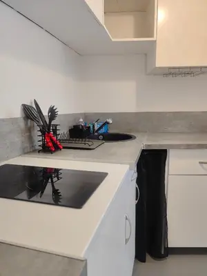 Cuisine ou kitchenette dans l'établissement Gîte PEGASUS - 5 min plage