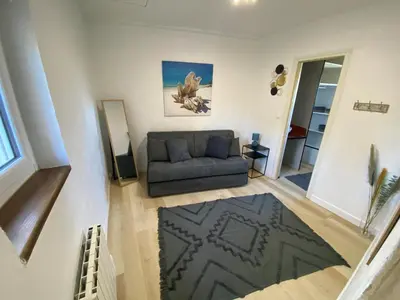 Coin salon dans l'établissement Maison de Charme 4 chambres