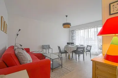 Coin salon dans l'établissement Appt agréable avec balcon au sud-ouest de Caen