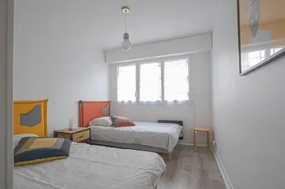 Un ou plusieurs lits dans un hébergement de l'établissement Appt agréable avec balcon au sud-ouest de Caen