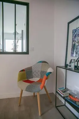 Coin salon dans l'établissement Appt agréable avec balcon au sud-ouest de Caen