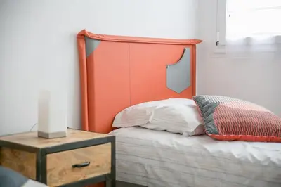 Un ou plusieurs lits dans un hébergement de l'établissement Appt agréable avec balcon au sud-ouest de Caen